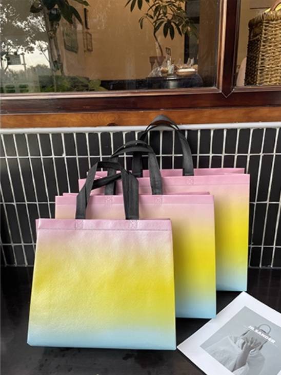 ถุงผ้าสปันบอนด์ สีกราเดี้ยน ไล่เฉด