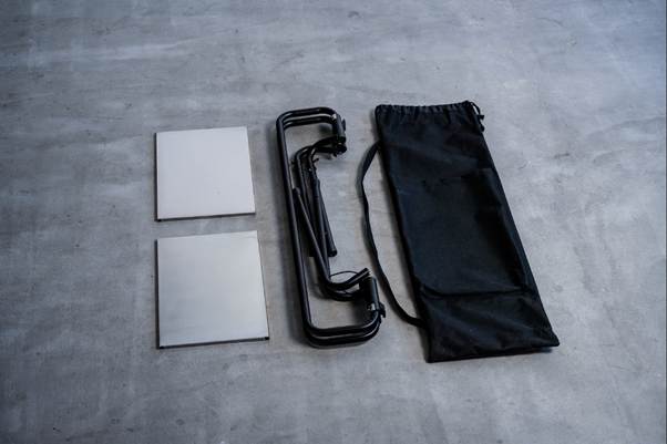 A black bag with a black bag and a black bag with a black handle

AI-generated content may be incorrect.