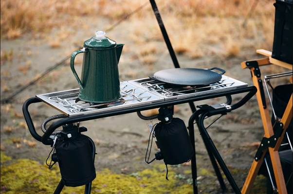 A table with a kettle on it

AI-generated content may be incorrect.