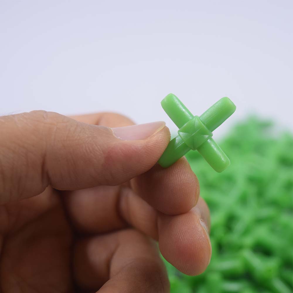ตัวแยกลม ข้อต่อลม 4 ทาง สีเขียว ใช้กับตู้ปลากุ้งหรือการเกษตร บรรจุ 50 ชิ้นใน 1 ถุง