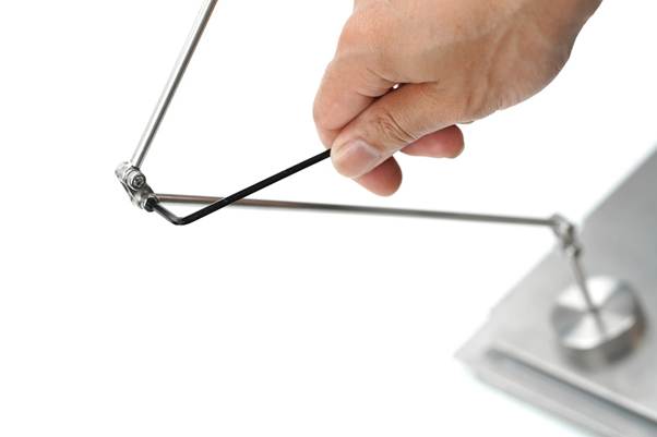 A hand holding a tool

AI-generated content may be incorrect.