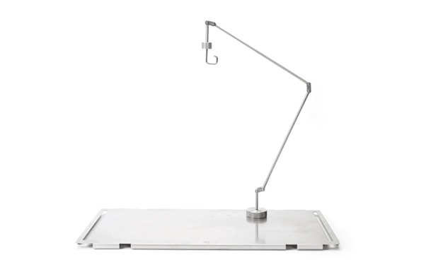 A metal hook on a metal surface

AI-generated content may be incorrect.