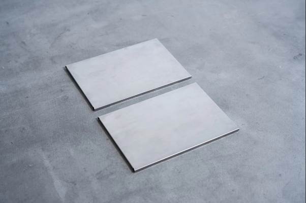 A pair of white square tiles

AI-generated content may be incorrect.
