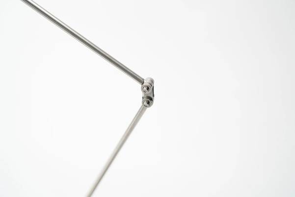 A close-up of a metal rod

AI-generated content may be incorrect.
