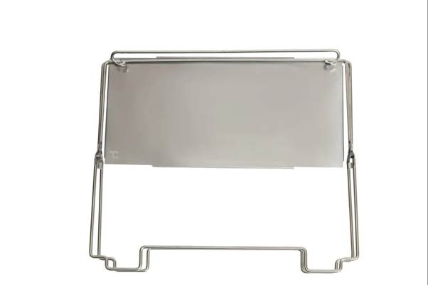 A metal stand with a white sheet

AI-generated content may be incorrect.