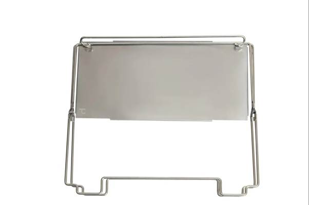 A metal stand with a white sheet

AI-generated content may be incorrect.
