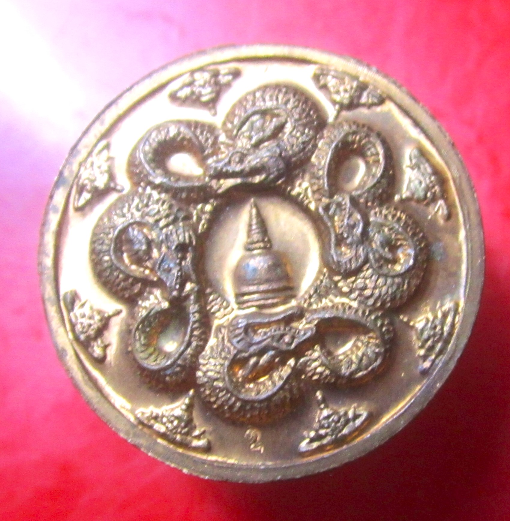 เหรียญท่านท้าวจตุคาม หลัง นาคเกี้ยว ตอกโค฿ดอุโลม ไม่ทราบที่
